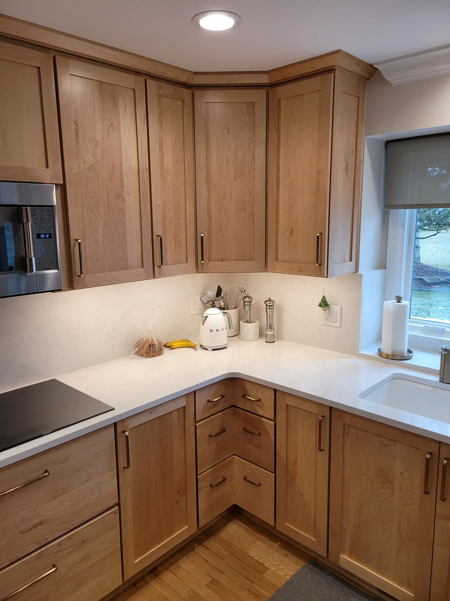 Kitchen corner with wooden cabinets
