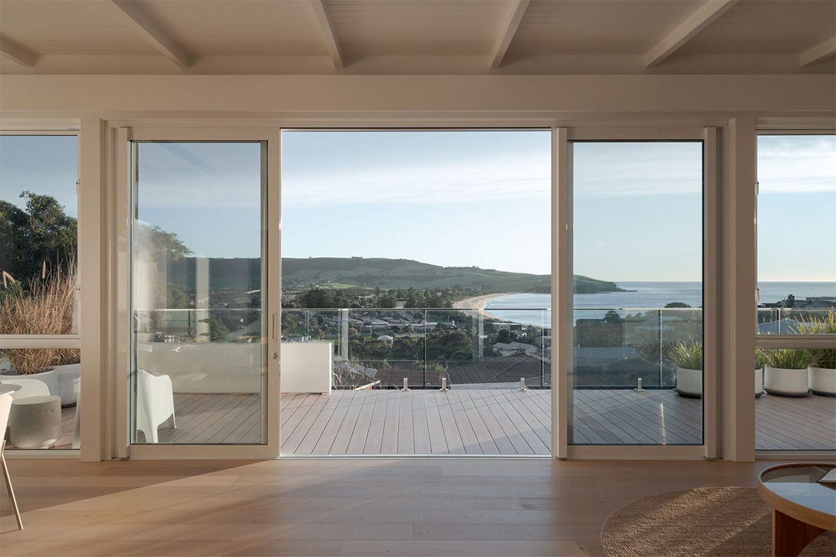Large-format glazing and doors positioned to maximise the coastal outlook