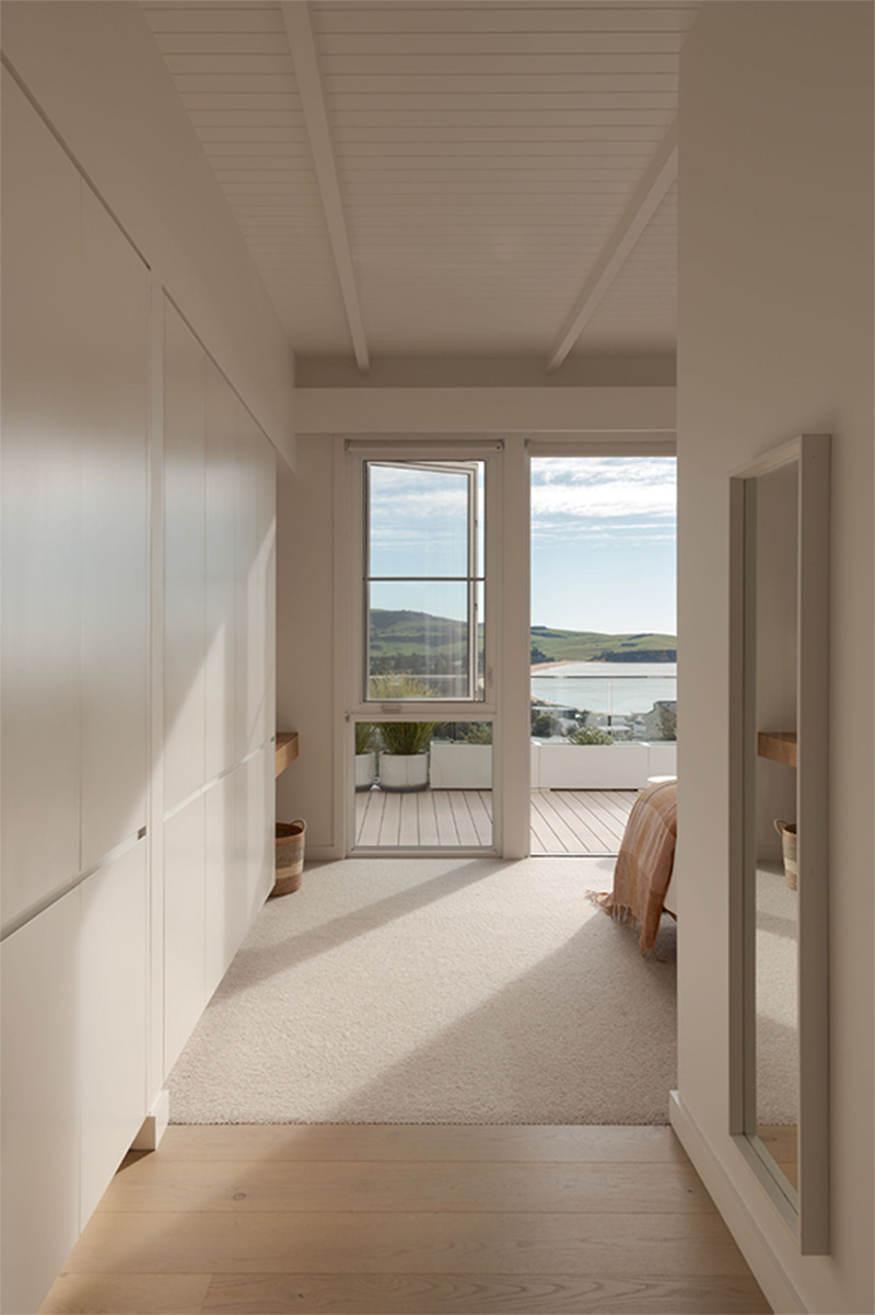 Strong indoor-outdoor connection through openings from deck to bedroom