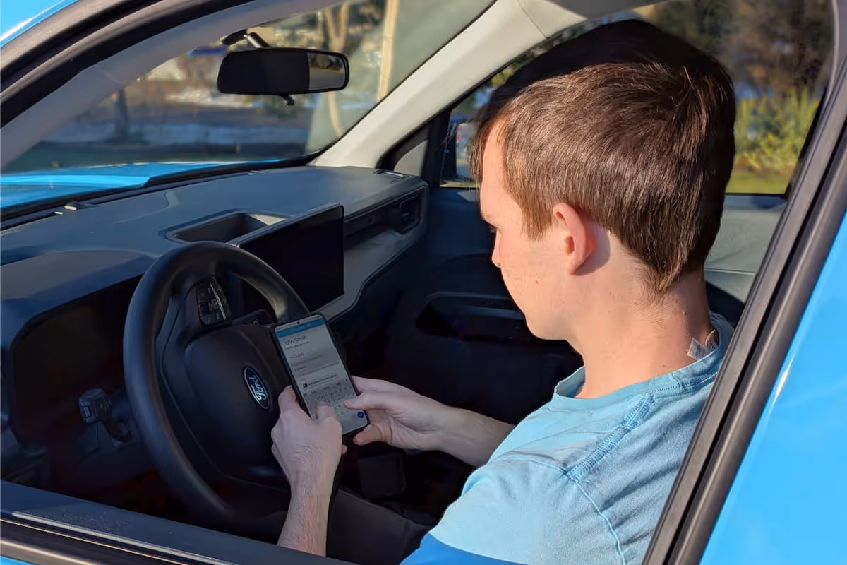 Doo Away team member adding notes to clients account using app