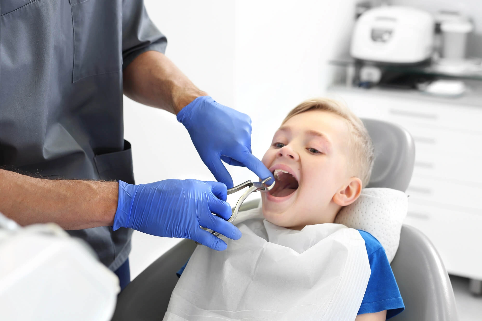 Child undergoing tooth extraction west chester pa