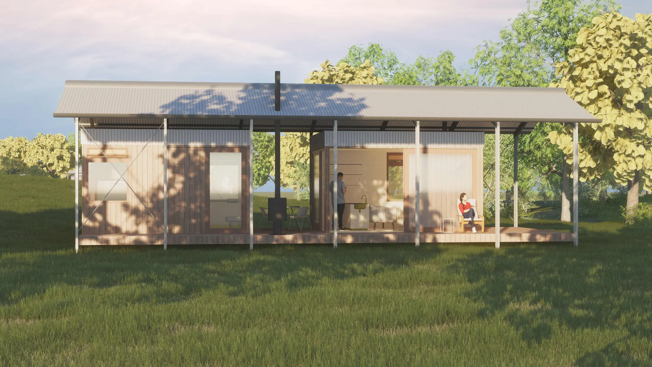 Modern small wooden Tiny Home with a metal roof, open porch, and large windows set in a grassy area with trees.