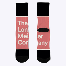 Pair of black and pink socks with the text 'The London Meisner Company' printed vertically in white.