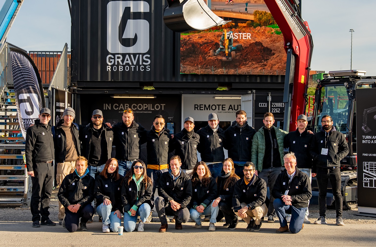 Gravis Robotics autonomous excavator loading gravel at a construction site