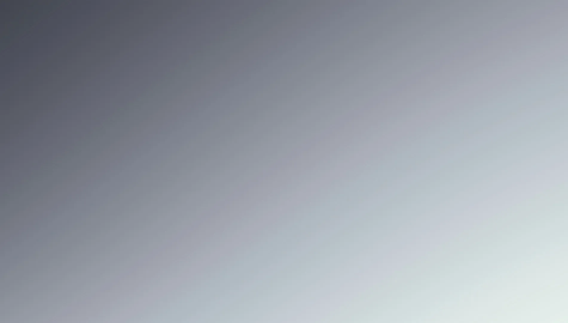 Minimal gradient background transitioning from white to gray.