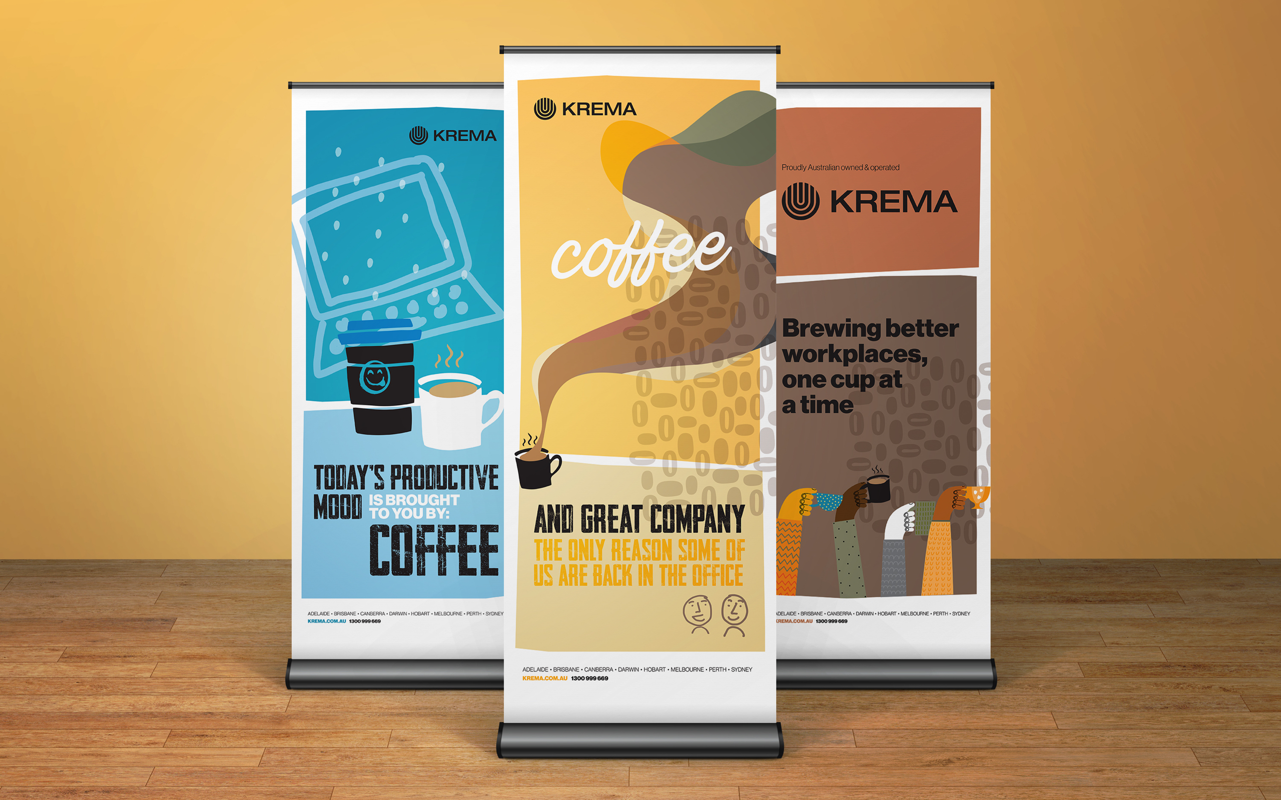 Three pull up banners with Saul Bass style illustrations and Krema branding. The banners are predominantly blue, yellow and brown.