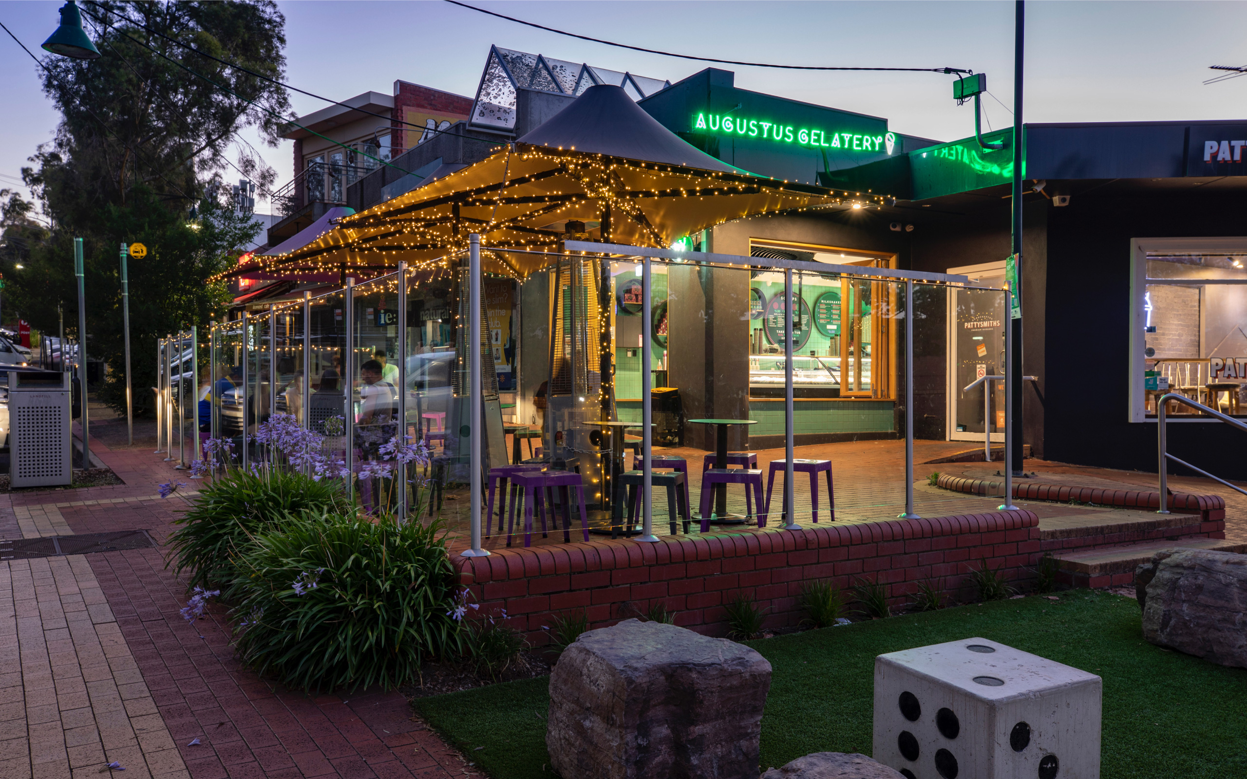 Exterior photo of Augustus Gelatery store in the evening.