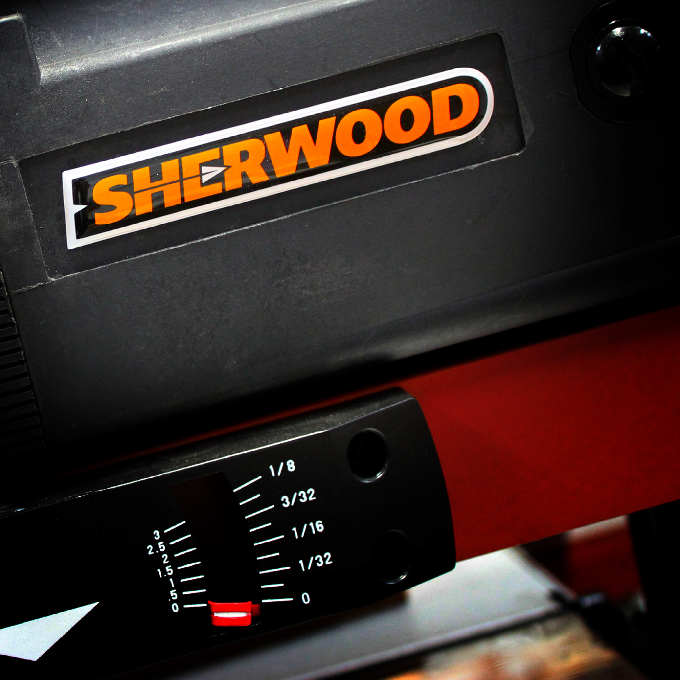 Close up of Sherwood logo on a piece of machinery.