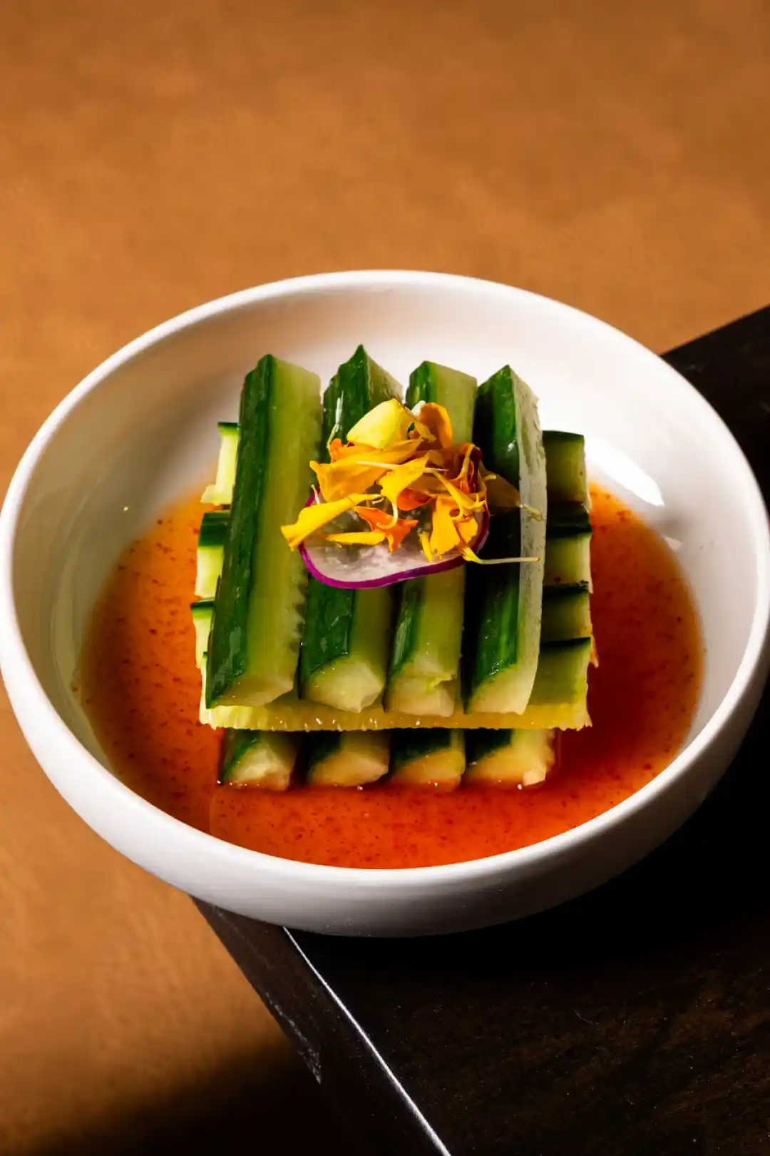Fresh cucumber rolls with tangy soy dressing — light and refreshing appetizer from Zen Modern Asian Bistro San Diego.