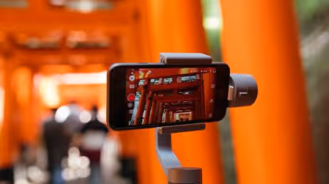capturing image of orange temple columns