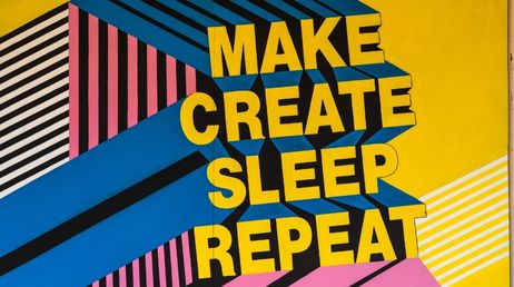 Creative bold wall art reading MAKE CREATE SLEEP REPEAT