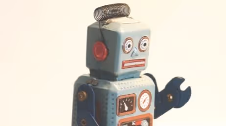 Vintage robot with expressive face and dials