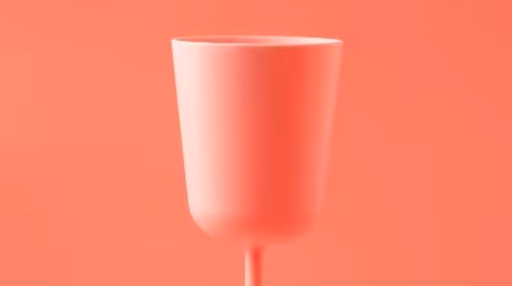 Minimalist pink cup on vibrant background