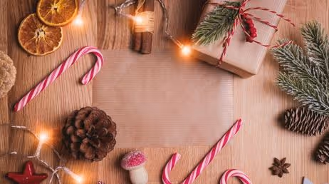 Holiday-themed flat lay with candy canes and decorations
