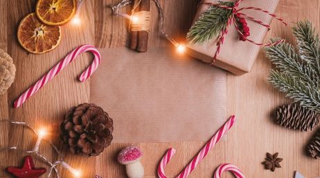 Holiday-themed flat lay with candy canes and decorations