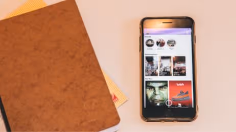 A smartphone on table with notebook