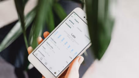 Instagram analytics insights on a smartphone screen