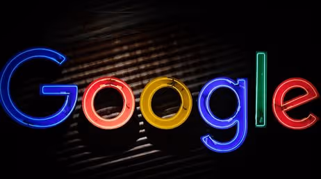 Google neon lights logo with dark background