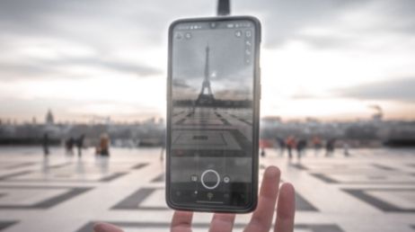Phone capturing Eiffel Tower in Paris through camera app