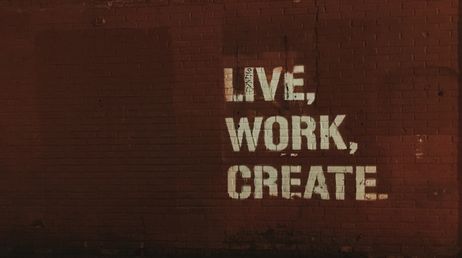 Live, Work, Create text on brick wall background