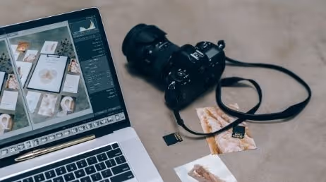 Laptop with camera and SD cards for photo editing