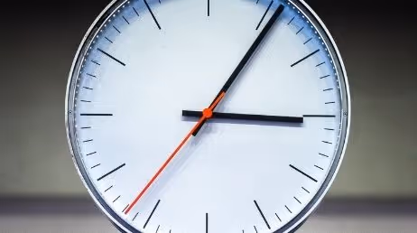 Minimalist wall clock with red second hand