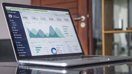 Laptop displaying data analytics dashboard