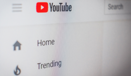YouTube homepage and trending options on screen