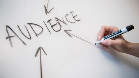 Hand drawing arrows pointing to the word Audience