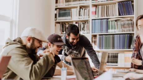 People collaborating and working together in a library