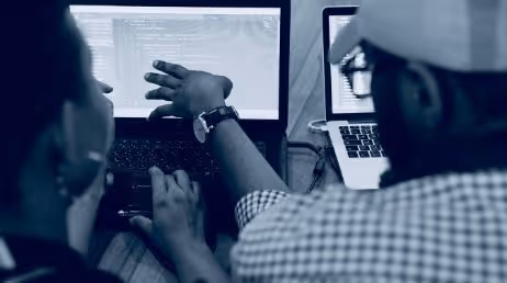 Two developers collaborating on coding project
