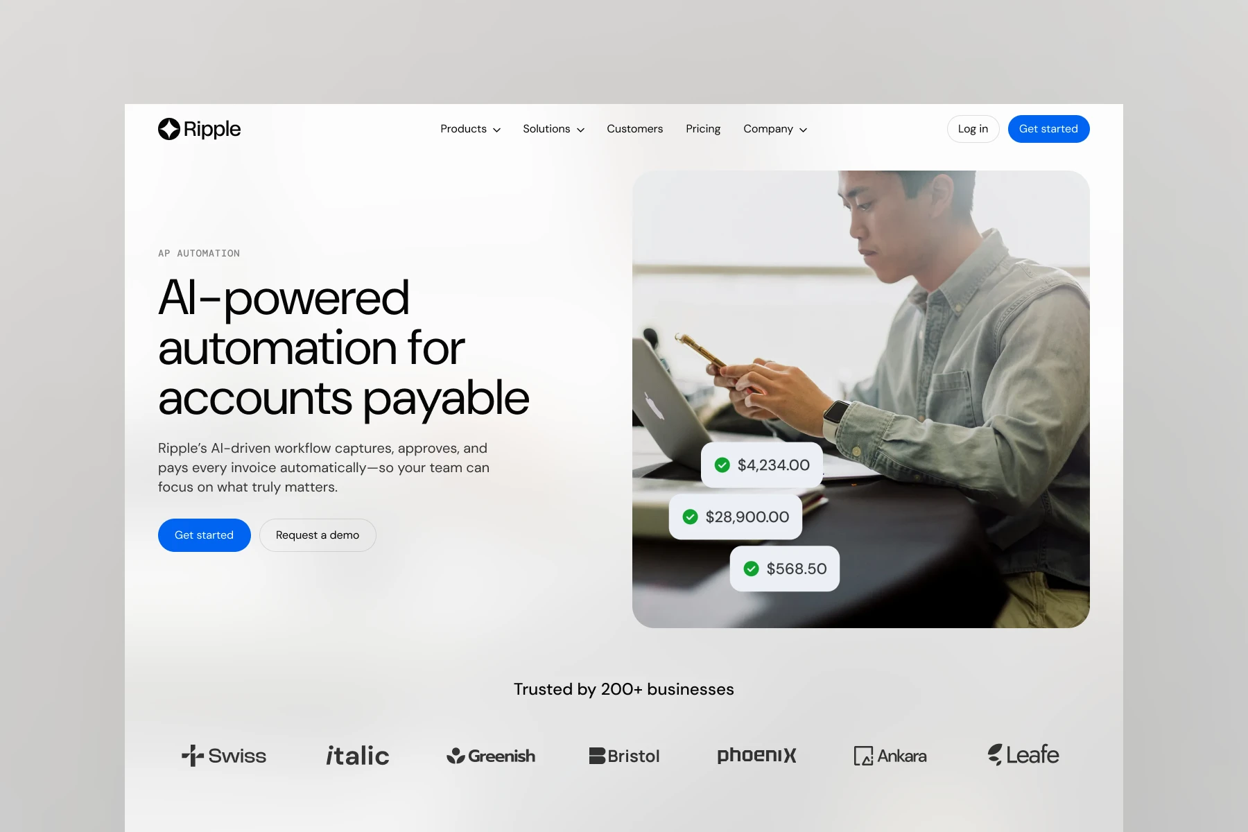 Website homepage showing AI-powered accounts payable automation with a man using a smartphone and laptop, displaying payment amounts.