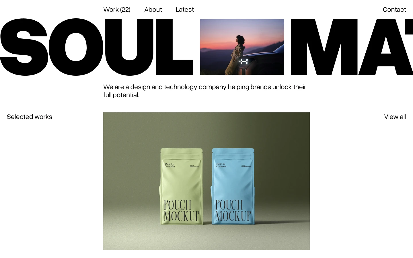 Website homepage with large text 'SOULMATE', a sunset photo of a person leaning on a car, and a product display of two pouch mockups in green and blue.