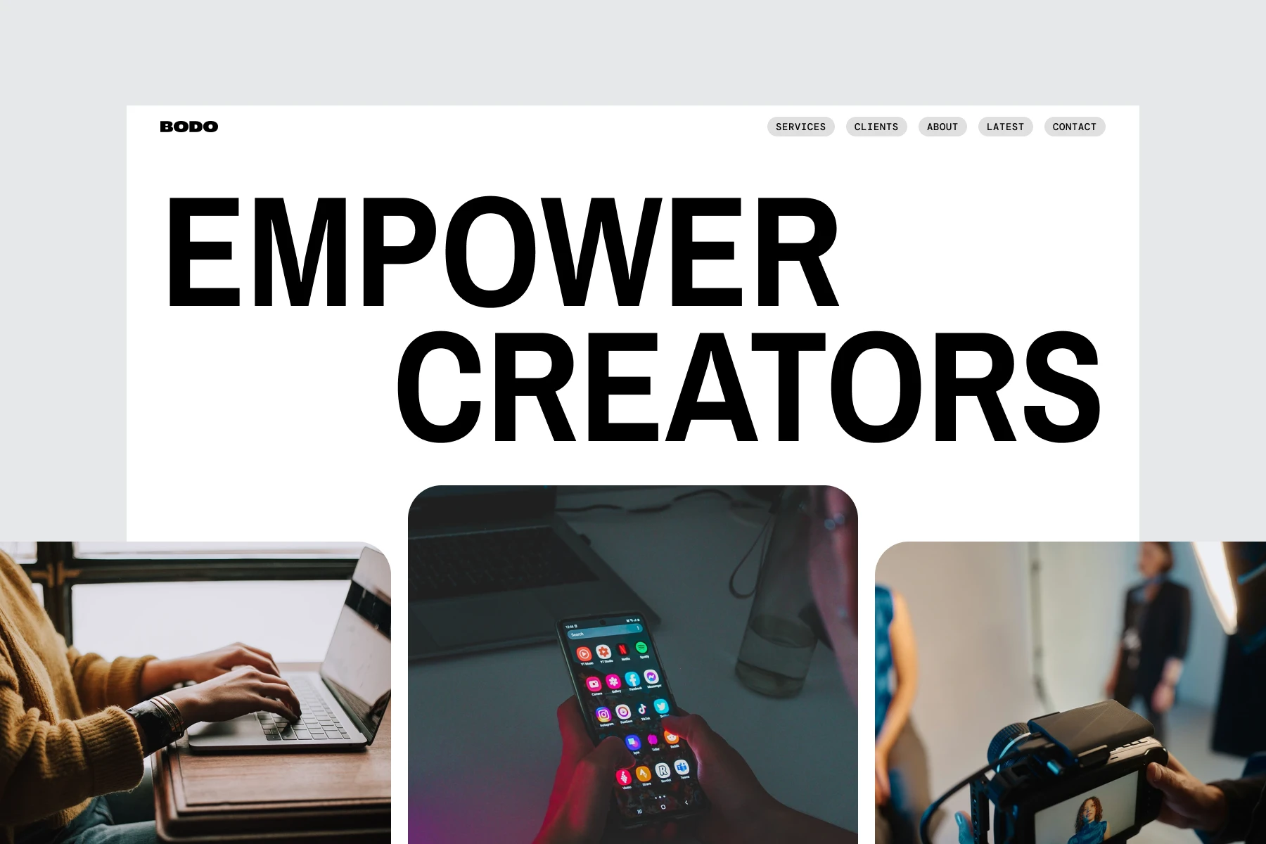 Website header with bold text 'EMPOWER CREATORS' above images of hands typing on a laptop, a person holding a smartphone, and a camera filming a woman.