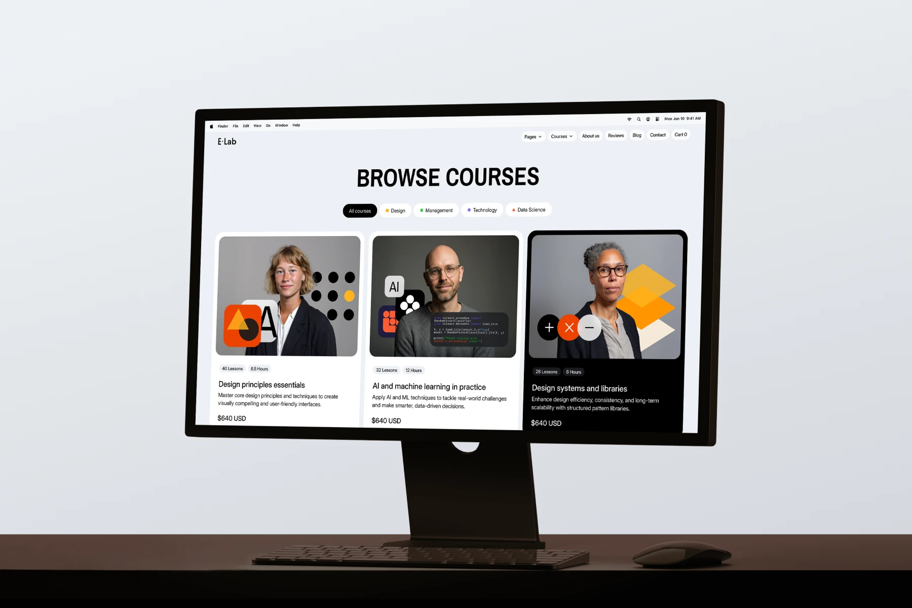 Computer monitor displaying an online course platform with three featured courses on design principles, AI and machine learning, and design systems.