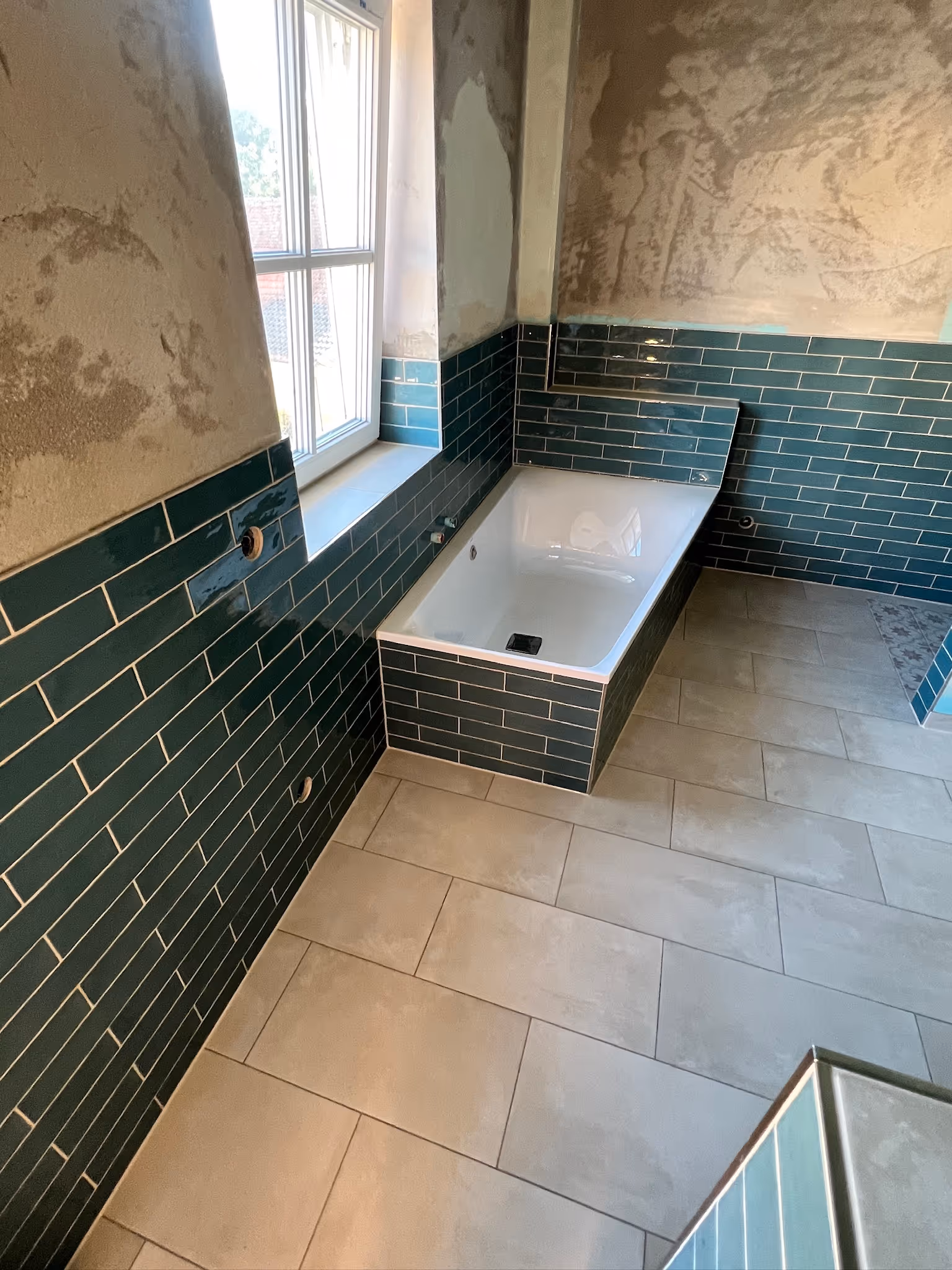 Badezimmerfliesen in eleganter Optik hochwertig verlegt in Alzenau