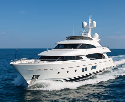 White luxury yacht cruising on calm blue ocean under clear sky.