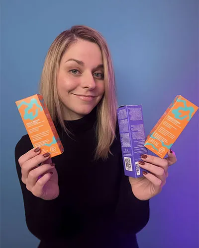 Alex Mileva holding packages