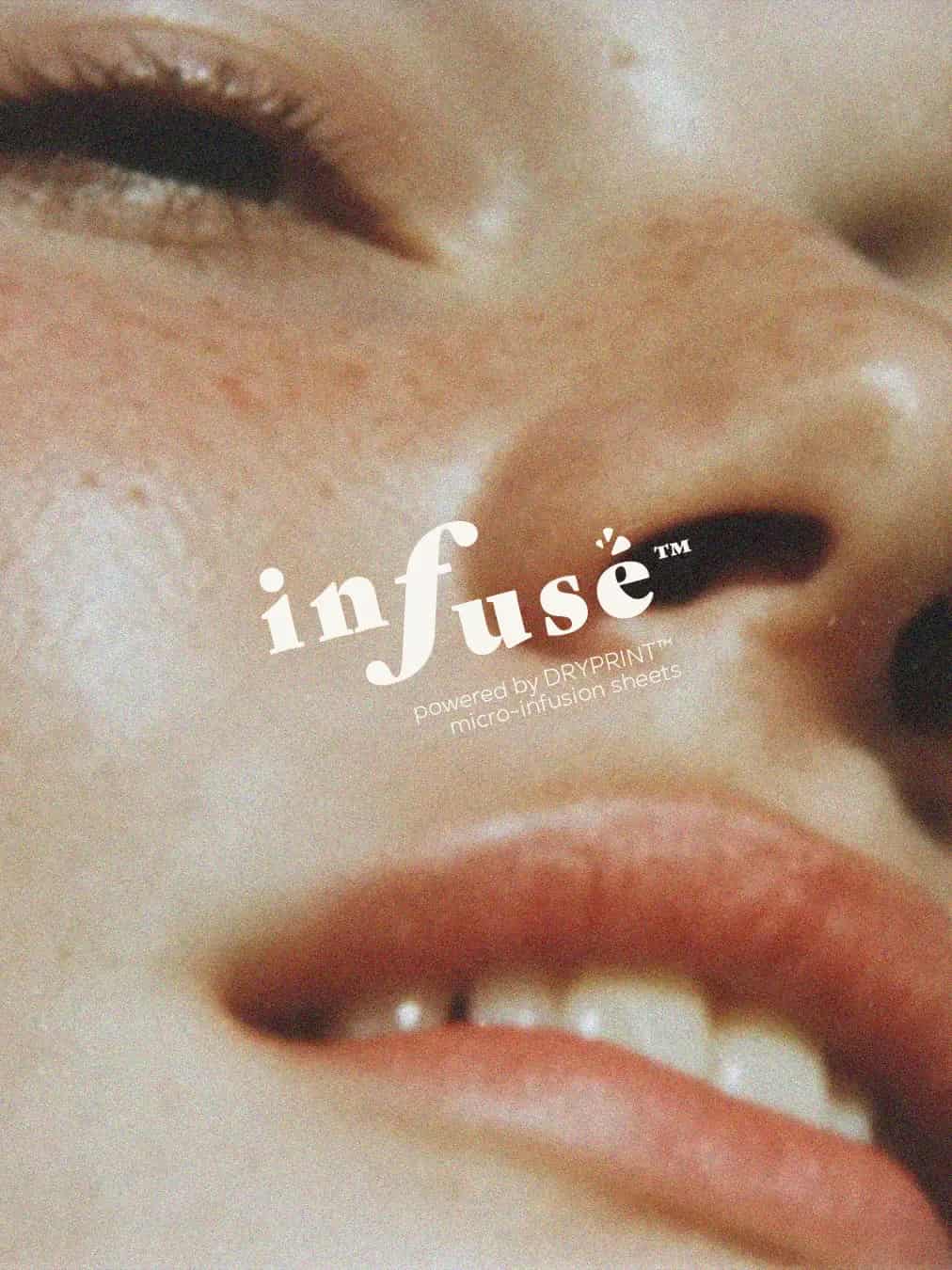 Infuse skincare mist packaging concept with text projected on model’s face.