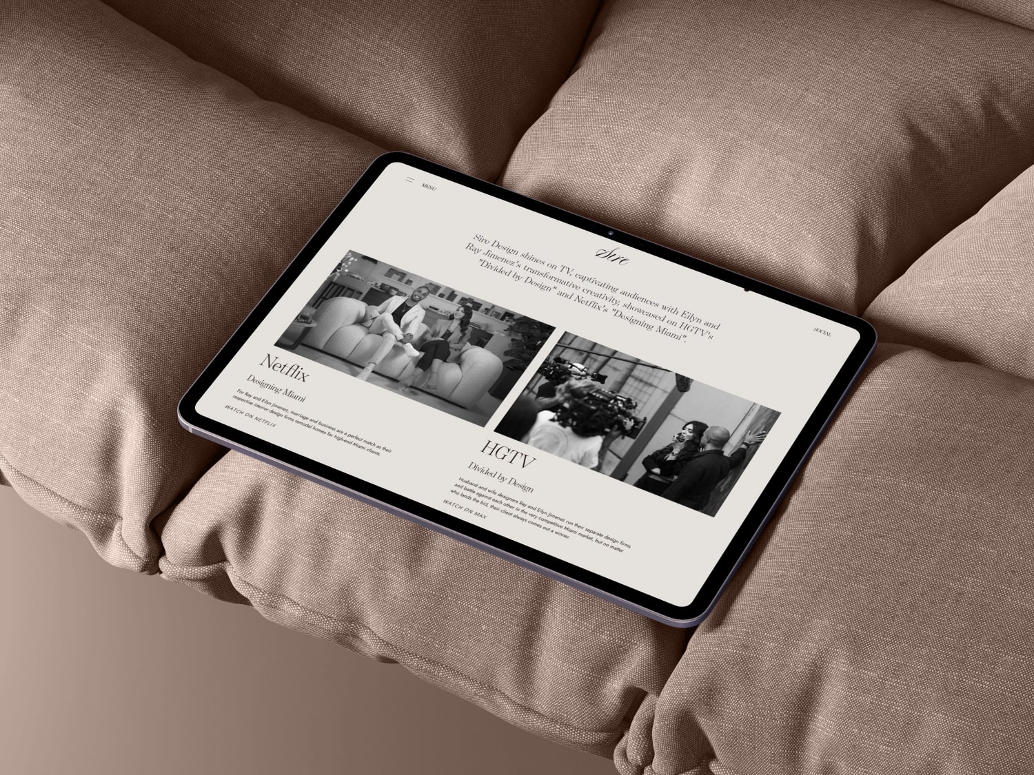 Tablet displaying a webpage featuring Sirve Design's TV appearances on Netflix's Designing Miami and HGTV's Divided by Design, placed on a beige fabric surface.