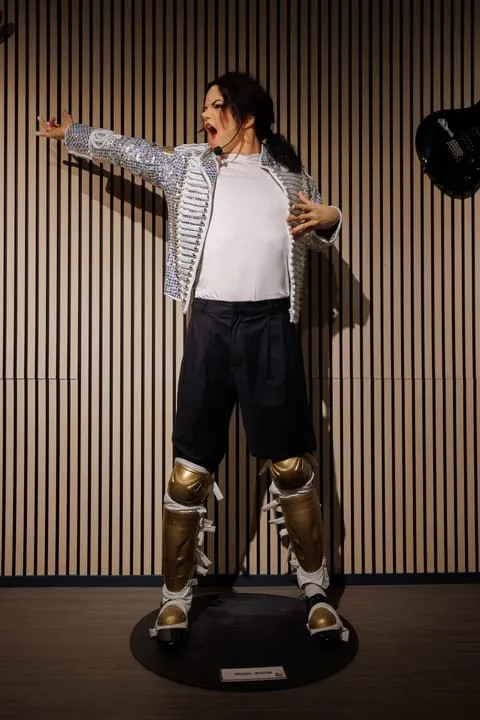 Wax figure of Michael Jackson in iconic sequined jacket and gold boots at WAX Museum of Legends Colmar