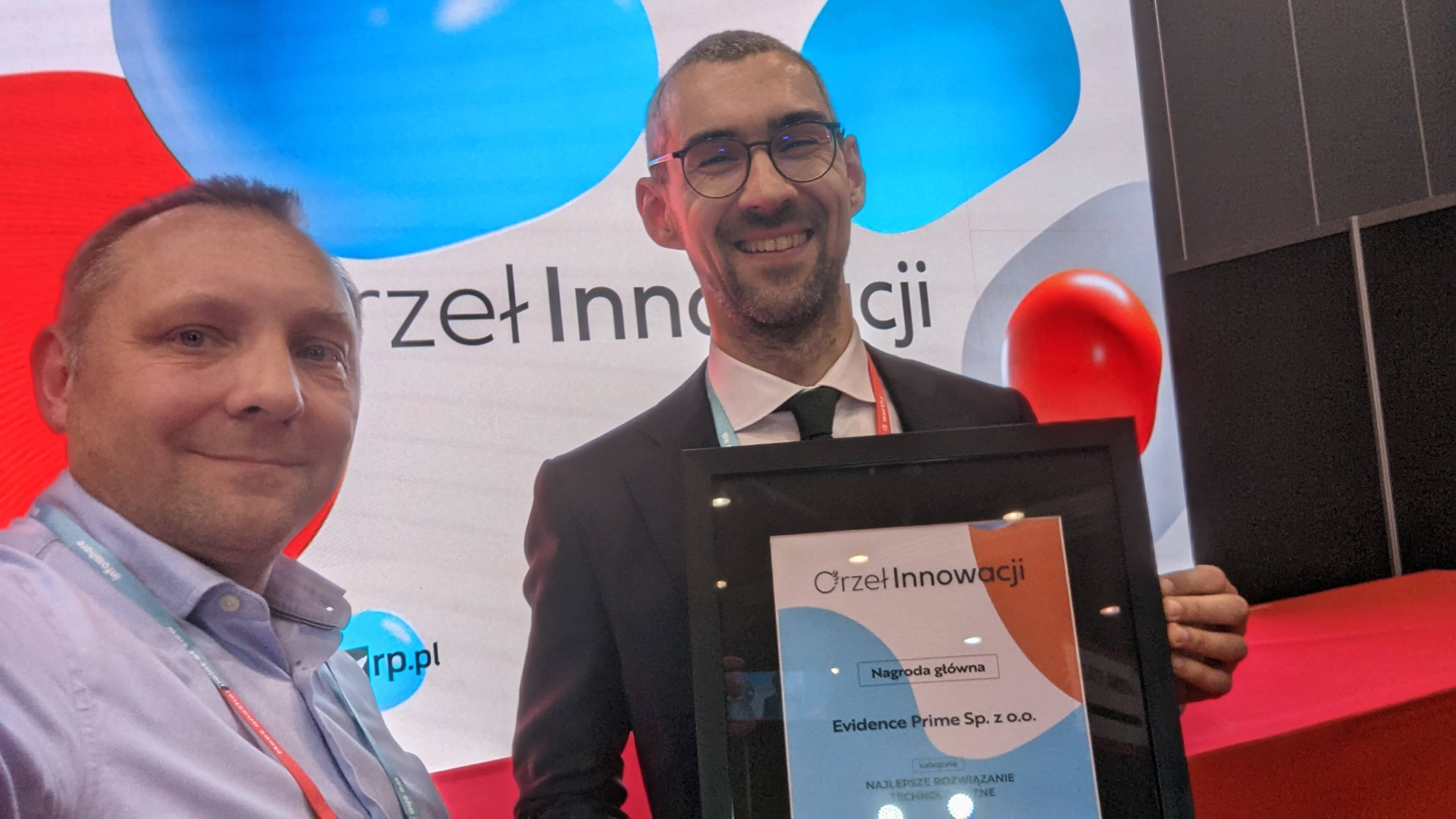 Founders of Laser AI holding the Eagle of Innovation award for Best Technological Solution