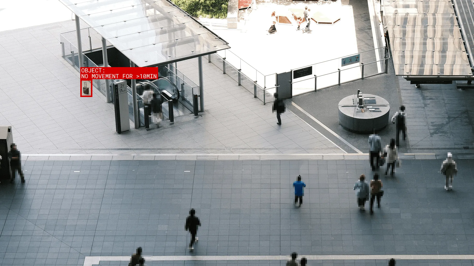 Open suitcase next to escalator marked with no movement warning for more than 10 minutes — Staige KI