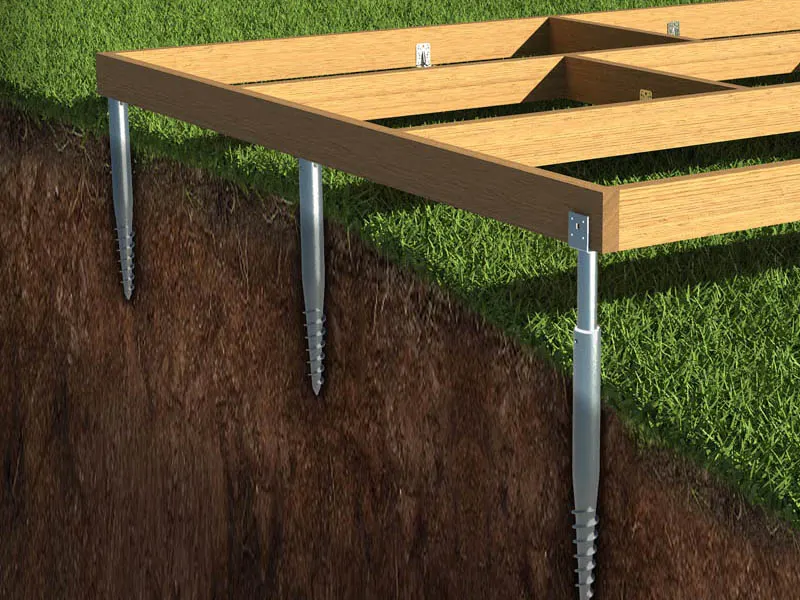 Cross-sectional view of wooden framework elevated by metal ground screws anchored into soil beneath grass.