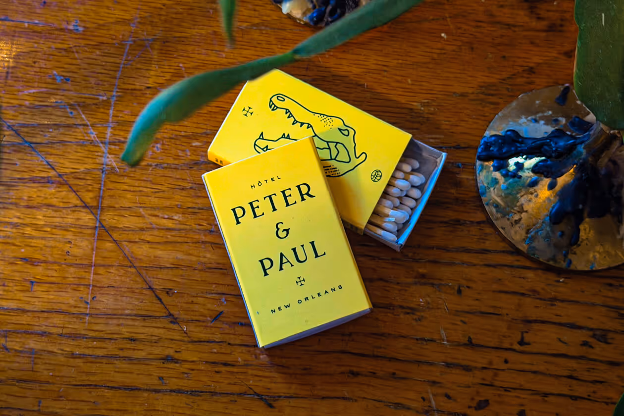Two boxes of custom printed matches. 