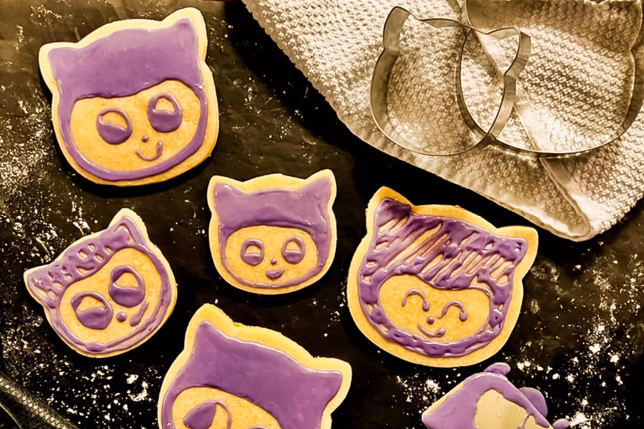 Github Octocat shaped cookie cutters and cookies. 