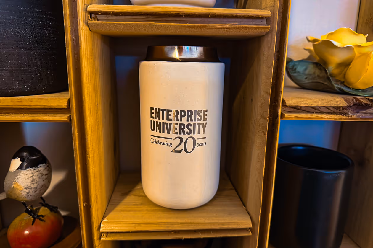 A laser engraved mug with Enterprise Bank on the front. 