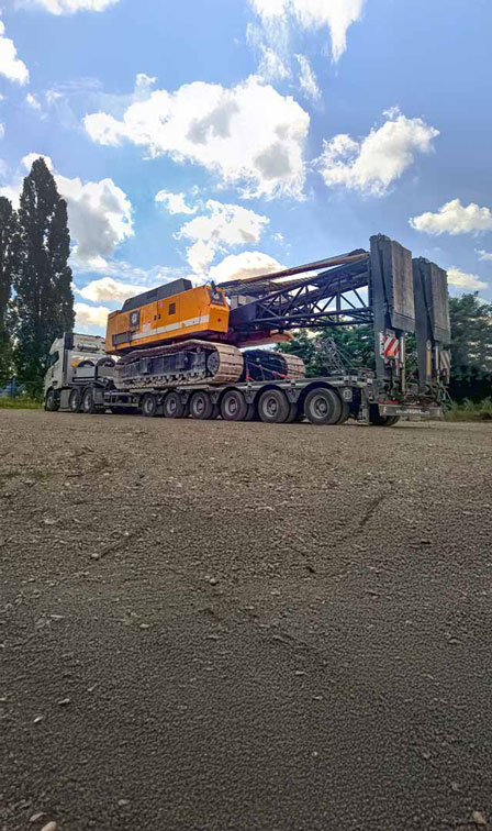 MultiMAX vehicles from the company Faymonville, loaded with a crane.
