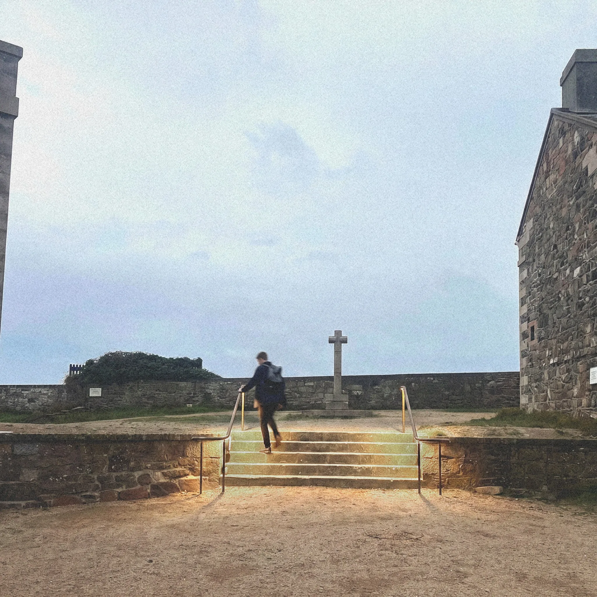 The monument steps at Elizabeth Castle with new bronze handrails and low-level lighting at dusk, St Helier, Jersey