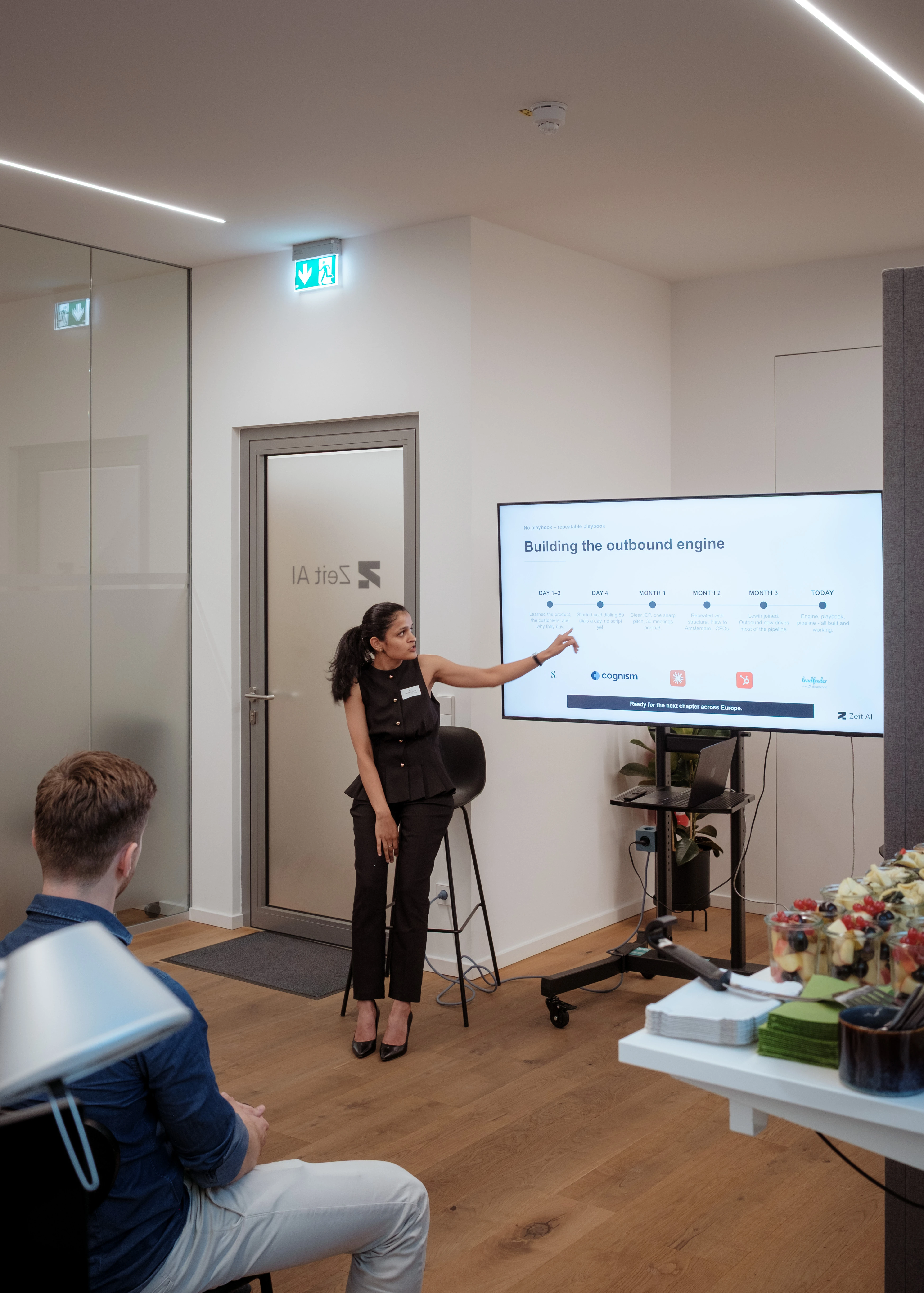 Team member presenting at a pitch event